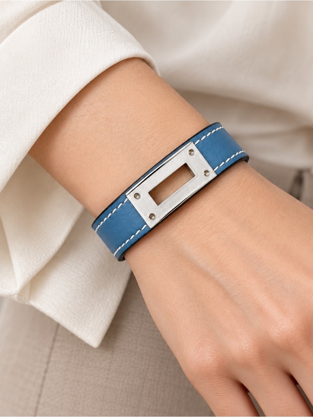 Hermés “Kelly” Blue Leather Bracelet Palladium Plaque White Contrast Stitching